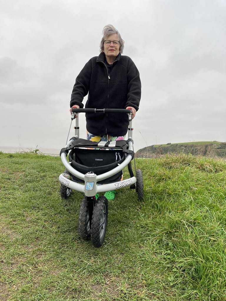 Judi walking out in the terrain