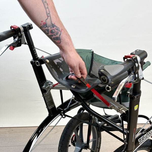 1. Grab the seat handle and pull it upwards and the Walker will start folding.